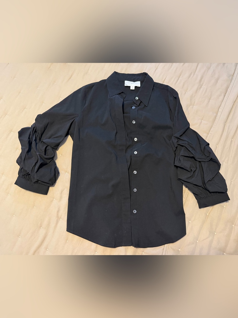 Women’s Tuckernuck blouse with ruffle sleeve detail